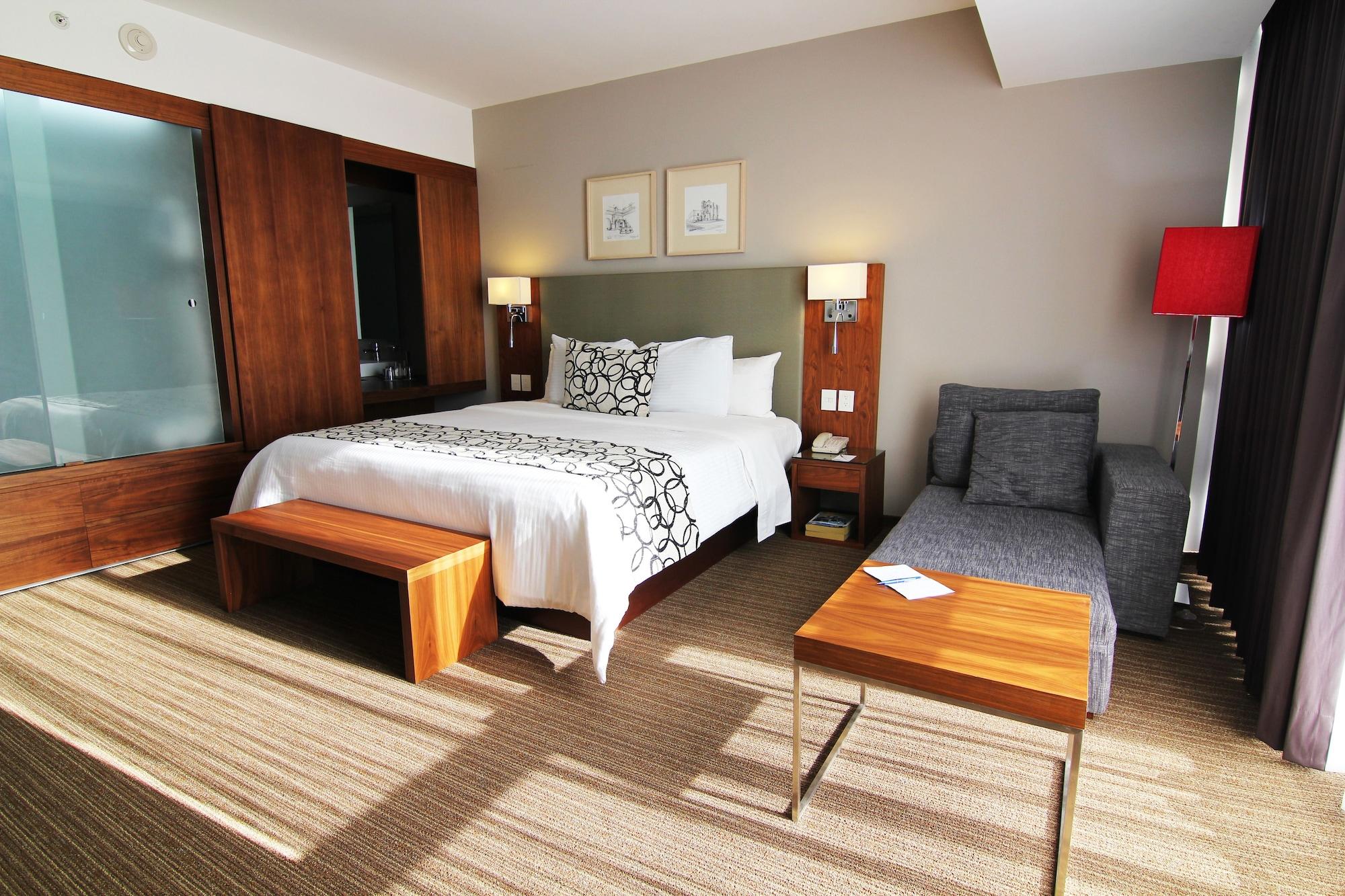 Miranda Casa Inn Premium Hotel Queretaro מראה חיצוני תמונה A room at the hotel
