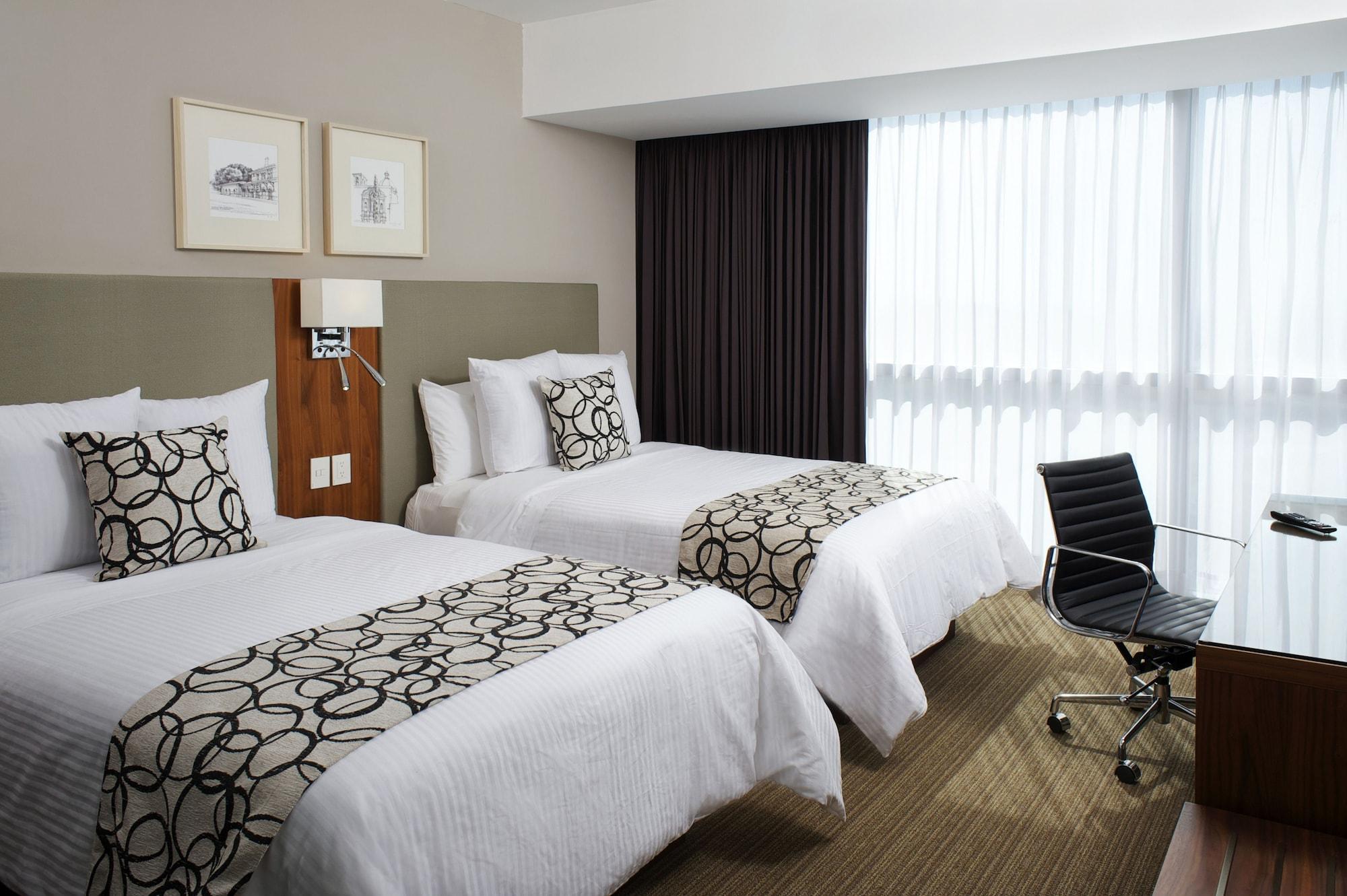 Miranda Casa Inn Premium Hotel Queretaro מראה חיצוני תמונה A room at the hotel