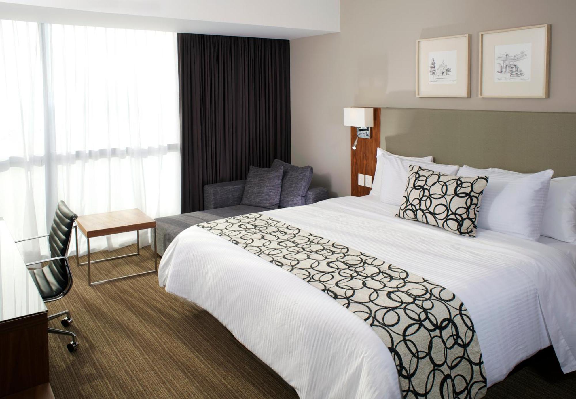 Miranda Casa Inn Premium Hotel Queretaro מראה חיצוני תמונה A bed runner