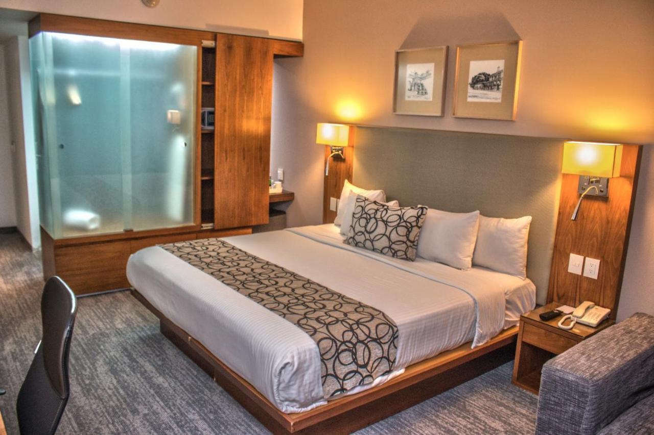 Miranda Casa Inn Premium Hotel Queretaro מראה חיצוני תמונה A room at the hotel