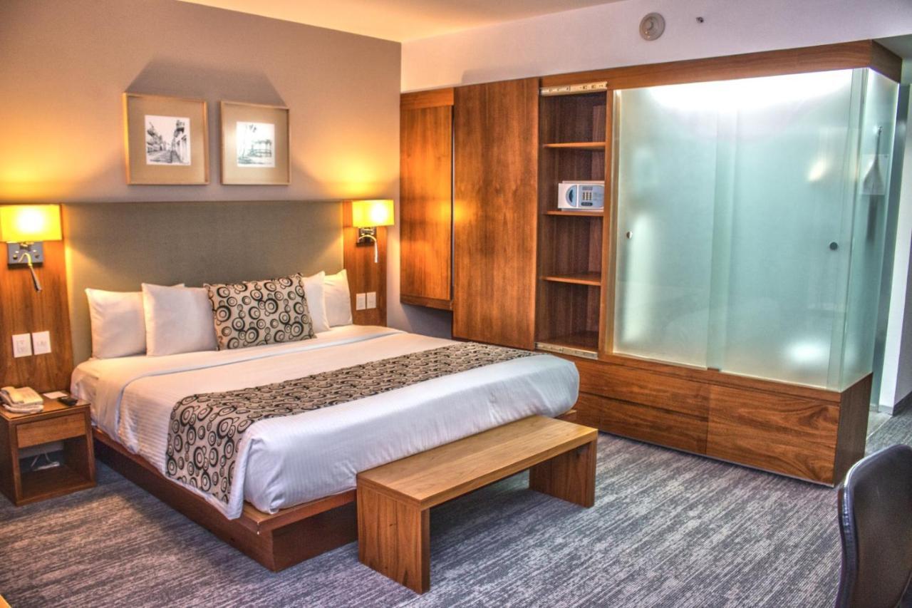 Miranda Casa Inn Premium Hotel Queretaro מראה חיצוני תמונה A room at the hotel